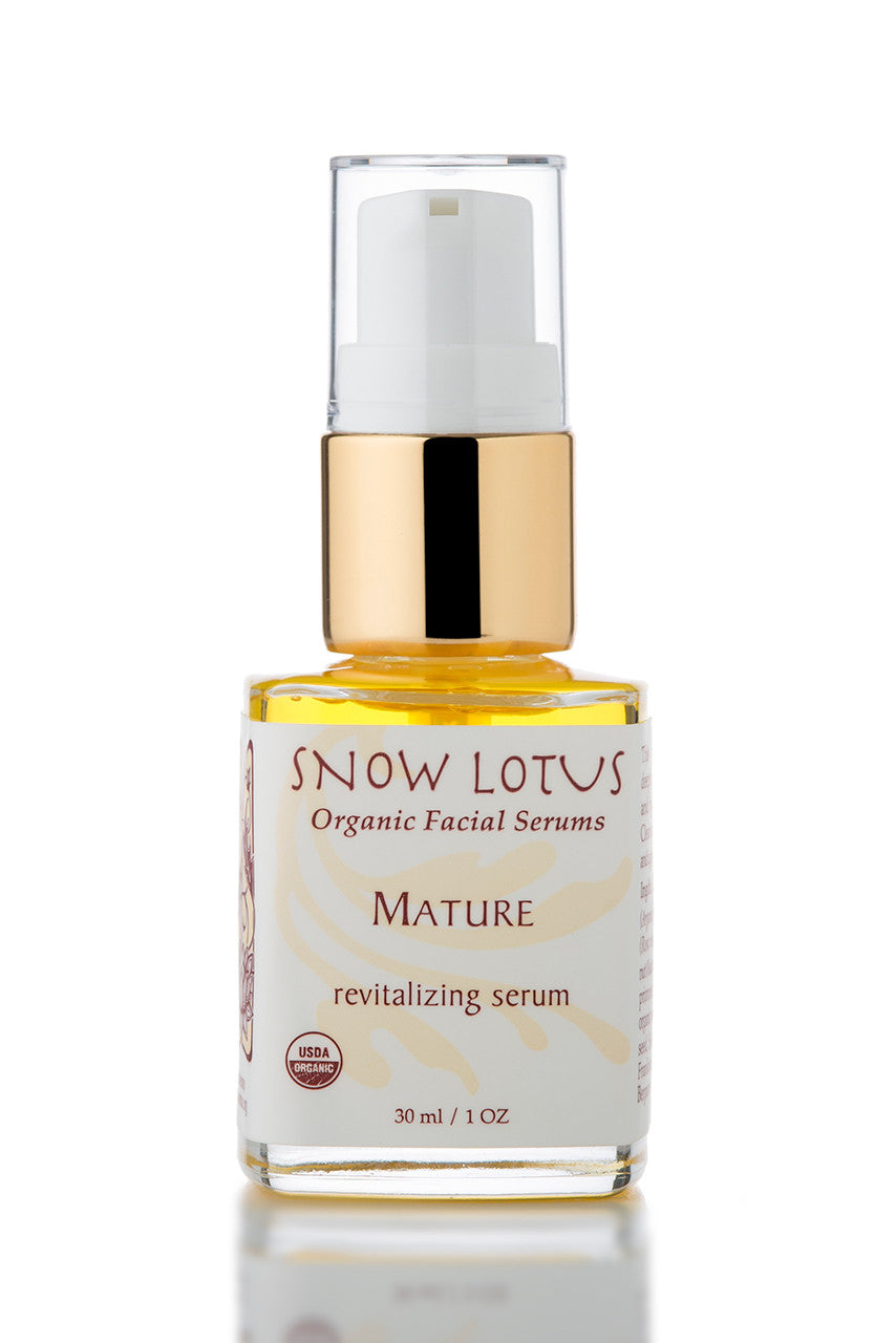 Snow Lotus Mature Skin Revitalizing Organic Facial Serum in a pump bottle, 30 ml