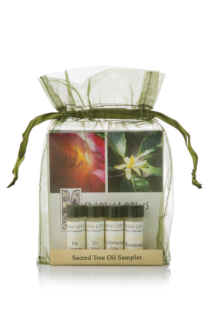 Sacred Tree Essential Oil Sampler in a green organza pouch