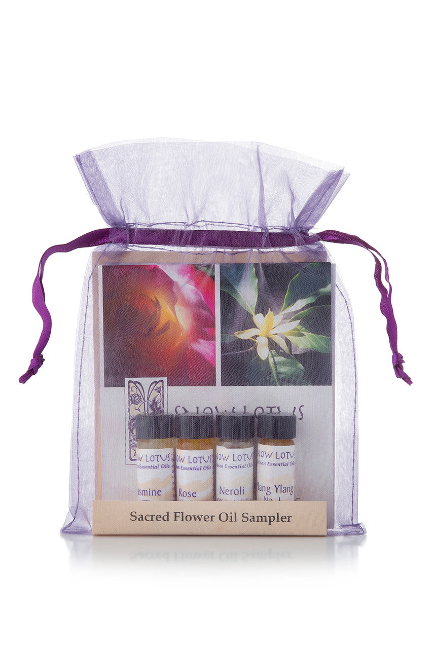 Sacred Flower Essential Oil Sampler in a purple organza pouch