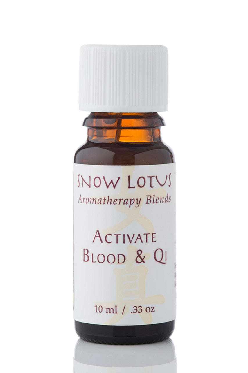 Snow Lotus Activate Blood & Qi - Woman's Precious Blend in an amber glass bottle
