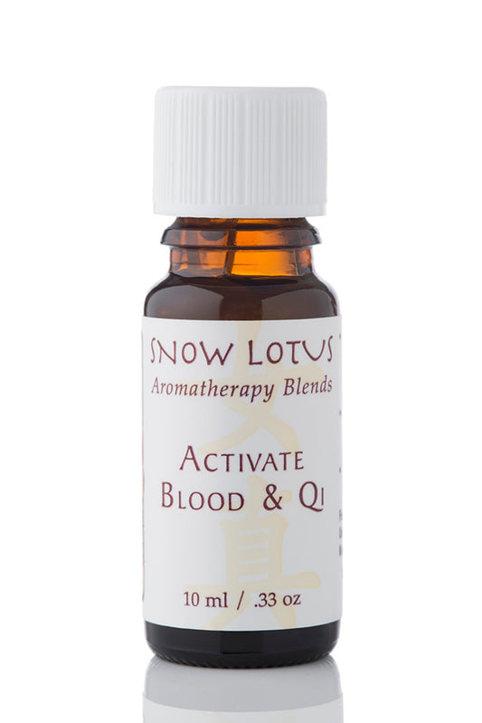 Snow Lotus Activate Blood & Qi - Woman's Precious Blend in an amber glass bottle