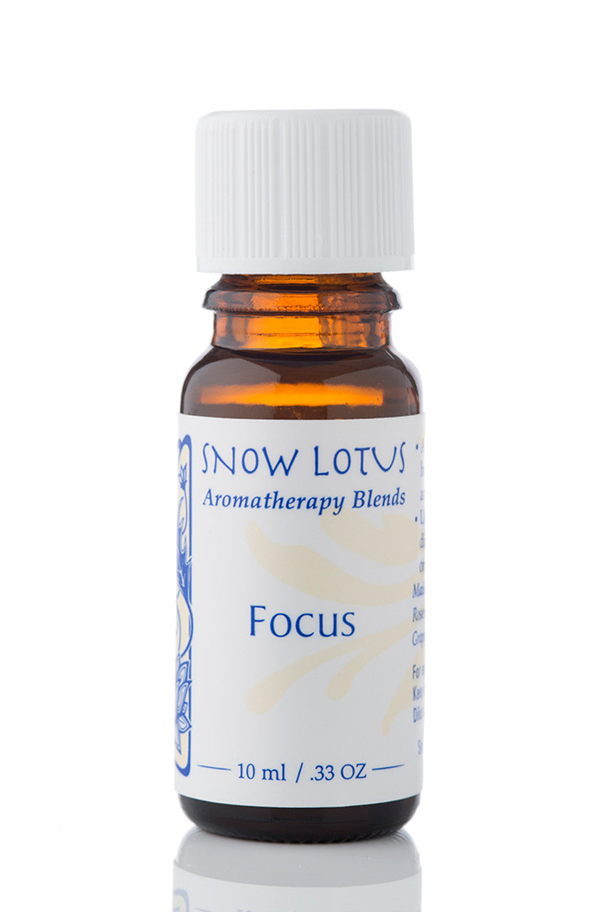 Snow Lotus Focus - Esthetic Essential Oil Blend in an amber glass bottle