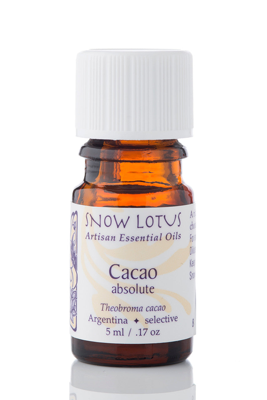 Snow Lotus Cacao Absolute 40% in an amber glass bottle