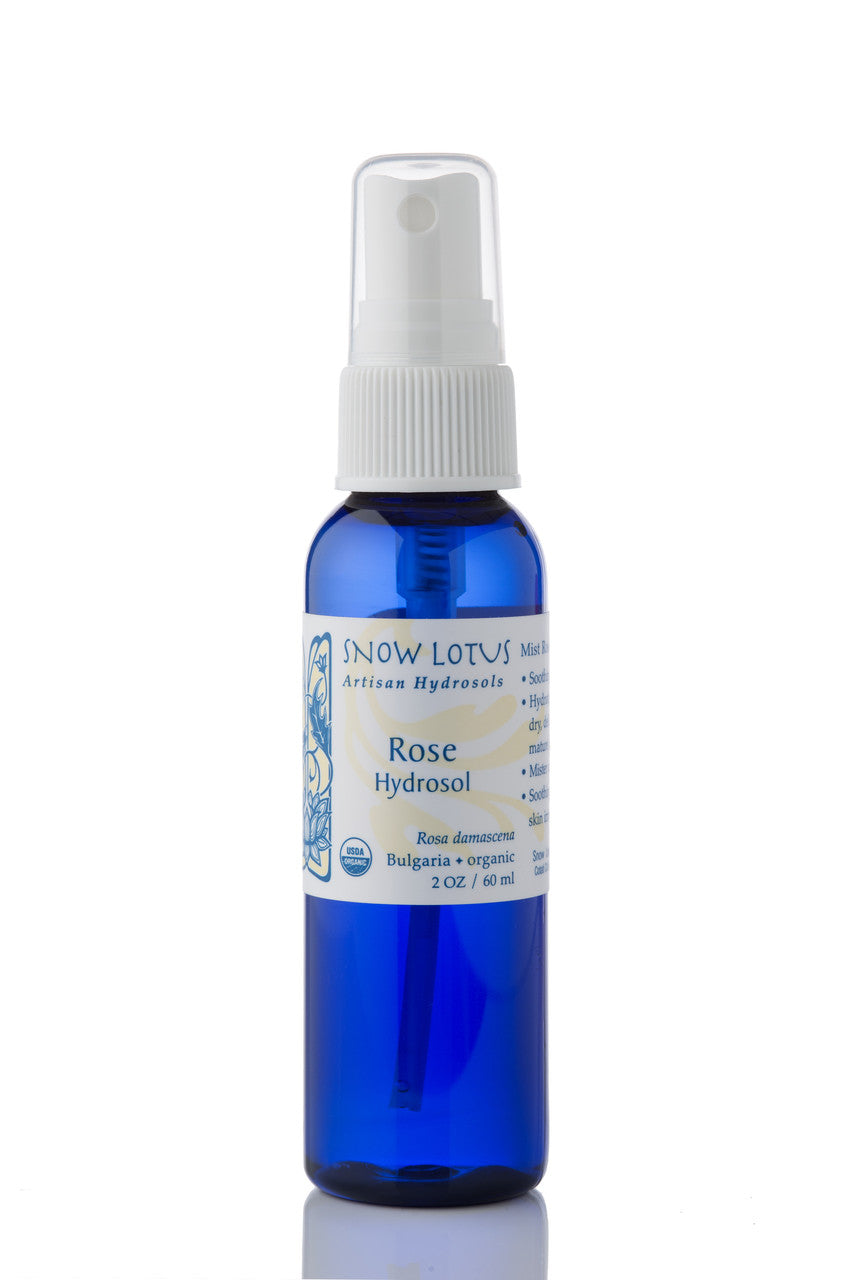 Snow Lotus organic Rose Hydrosol (Rosewater) in a blue spray bottle
