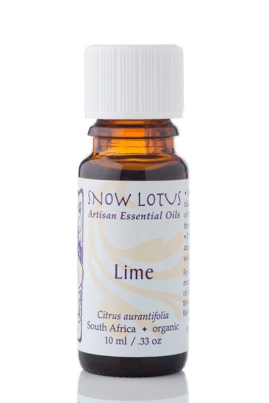 Snow Lotus Lime Essential Oil in an amber glass bottle