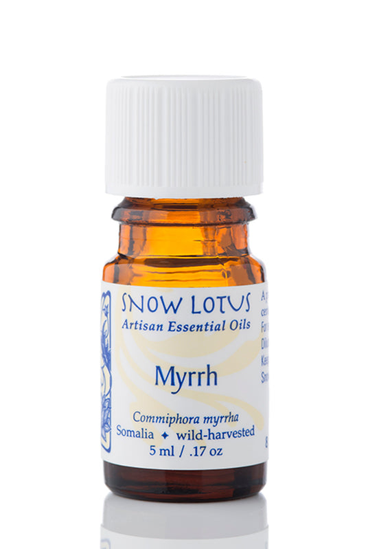 Snow Lotus Myrrh Essential Oil in an amber glass bottle