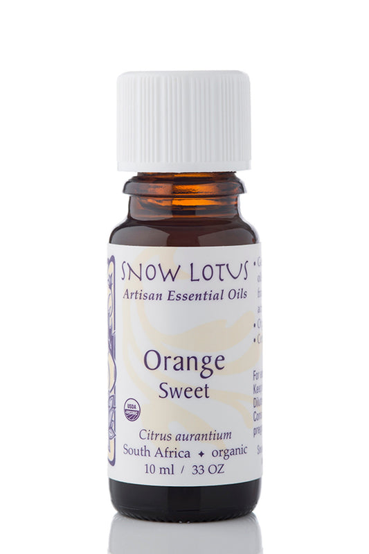 Snow Lotus organic Sweet Orange Essential Oil in an amber glass bottle