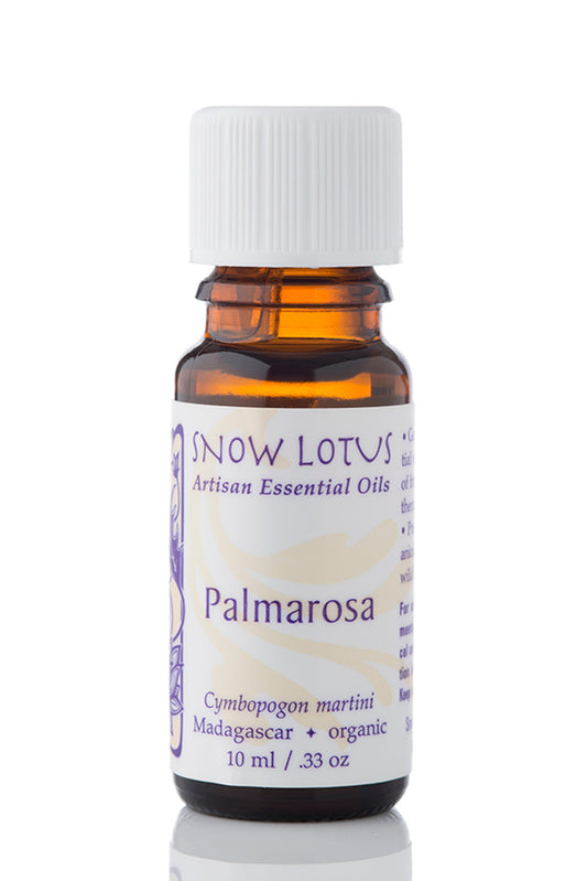 Snow Lotus organic Palmarosa Essential Oil in an amber glass bottle