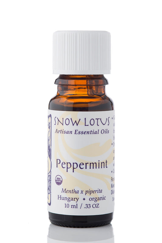Snow Lotus organic Peppermint Essential Oil in an amber glass bottle