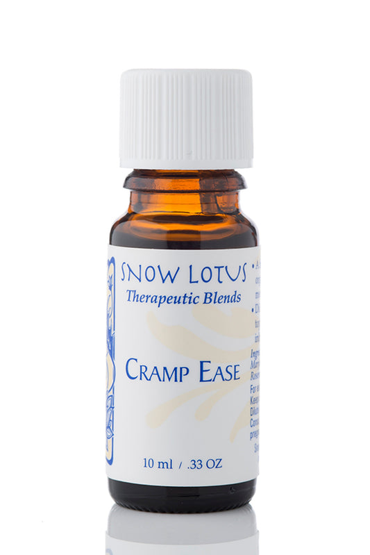 Snow Lotus Cramp Ease - Therapeutic Essential Oil Blend in an amber glass bottle