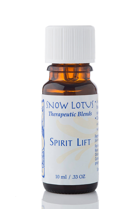 Snow Lotus Spirit Lift - Therapeutic Essential Oil Blend in an amber glass bottle