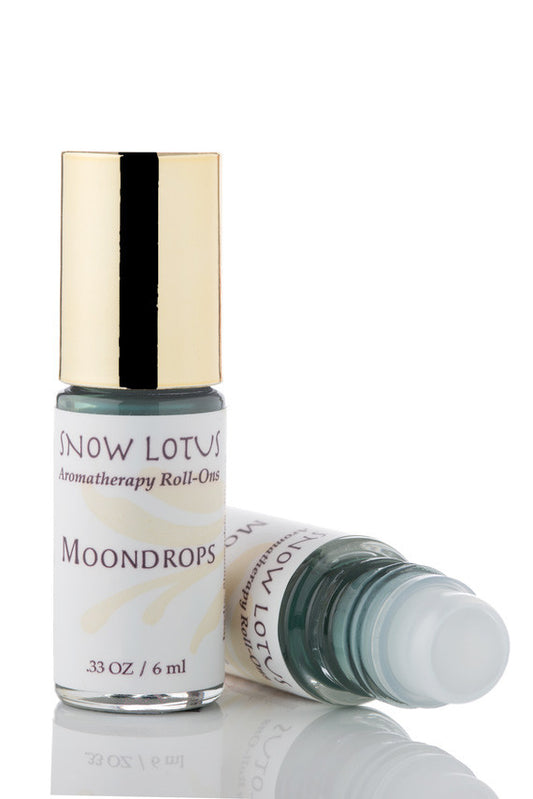 Snow Lotus Moondrops - Esthetic Roll On in a roll-on bottle with a metallic cap