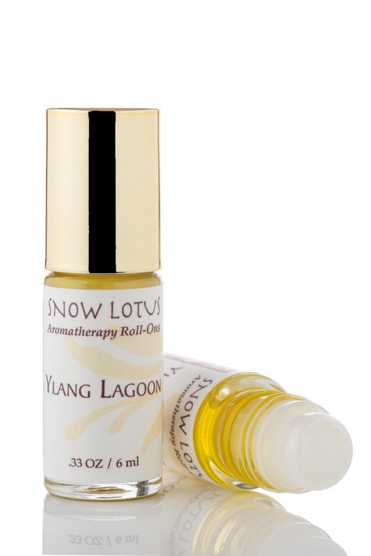 Snow Lotus Ylang Lagoon - Esthetic Roll On in a roll-on bottle with a metallic cap